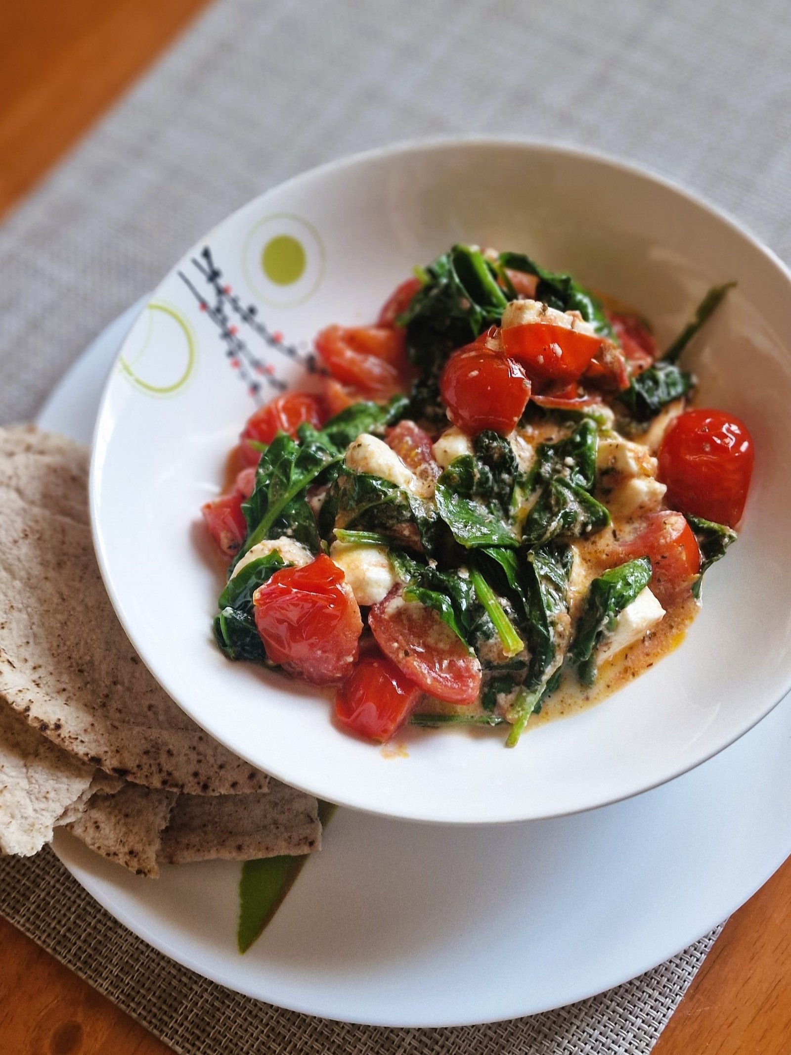 Sauteed tomatoes with feta and spinach