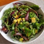 Tofu salad with greens and blueberries