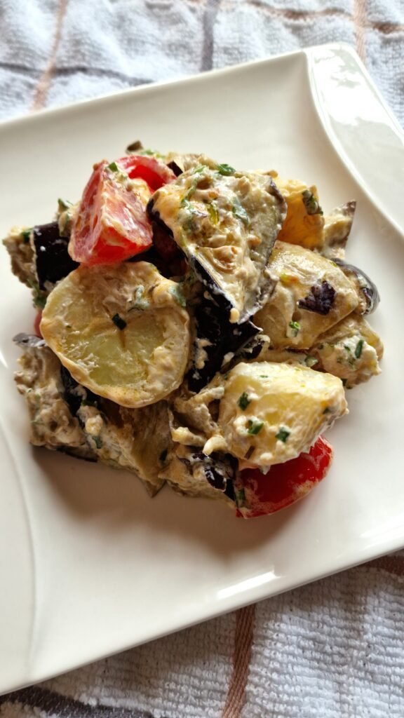 Potato aubergine and goats cheese salad